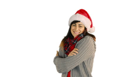 Frau-Mit-Weihnachtsmütze-Und-Warmer-Kleidung-Bläst-über-Die-Hände-