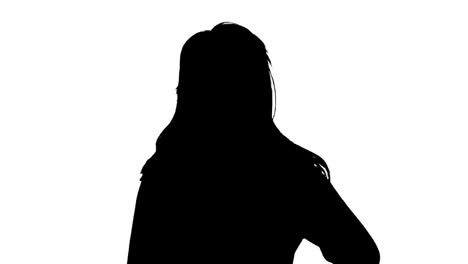 Silhouette-of-woman-blowing-a-kiss