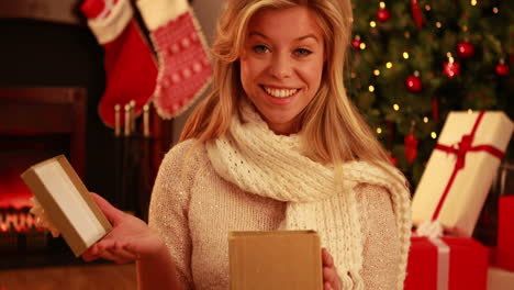 Pretty-blonde-opening-gift-at-christmas