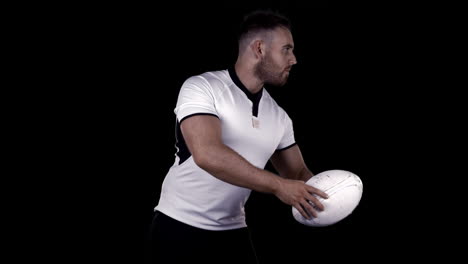 Serious-rugby-player-with-ball