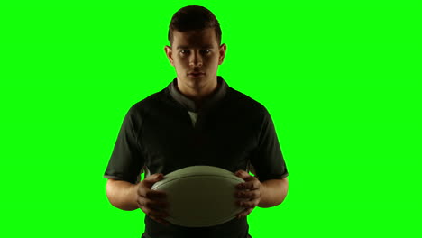 Serious-rugby-player-with-ball-