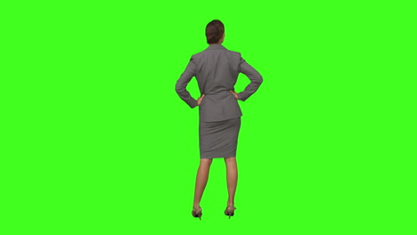 Businesswoman-standing-with-hands-on-hips