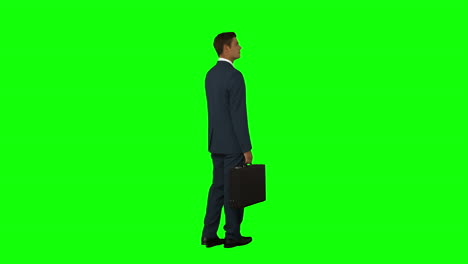 Businessman-standing-with-his-briefcase