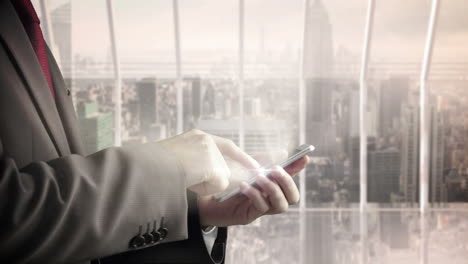 Hombre-De-Negocios-Usando-Teléfono-Inteligente-Con-Rascacielos-En-El-Fondo