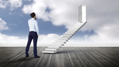 Businessman-looking-at-stair-with-an-opening-door-on-wood-ground-