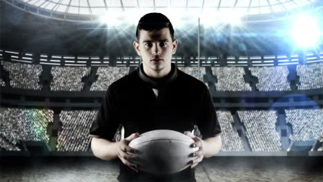 Serious-rugby-player-brings-rugby-ball
