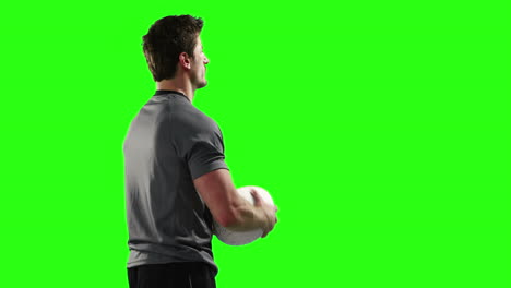 Ernsthafter-Rugbyspieler-Mit-Ball