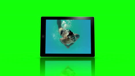 Media-device-screens-showing-girl-swimming