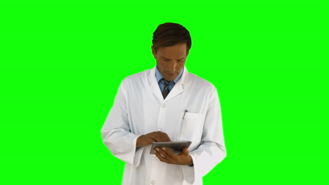 Serious-doctor-using-tablet