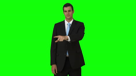 Businessman-pointing-something-with-his-finger