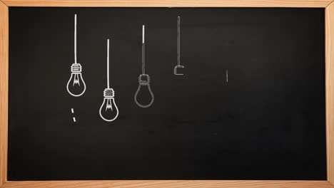 Light-bulbs-appearing-on-chalkboard