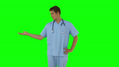 Surgeon-standing-with-hand-out