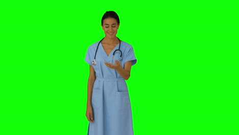 Krankenschwester-Präsentiert-Mit-Ihrer-Hand