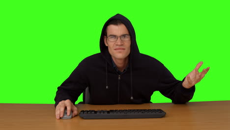 Hacker-typing-at-his-desk