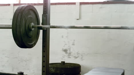 Focus-on-heavy-barbell-in-crossfit-gym