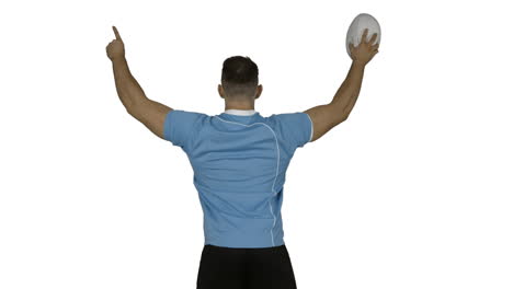 Serious-rugby-player-cheering-with-ball