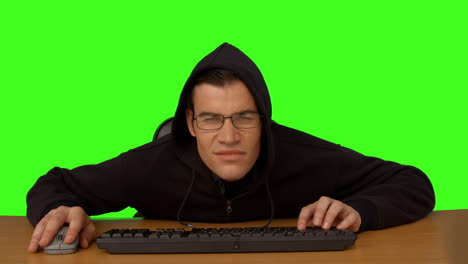 Hacker-typing-at-his-desk