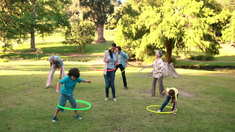 Extended-family-playing-with-hula-hoops