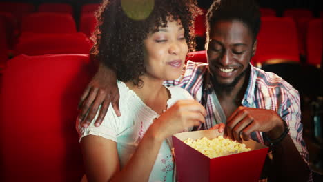 Cute-couple-watching-a-movie-