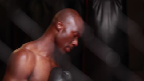 Man-boxing-at-crossfit-gym