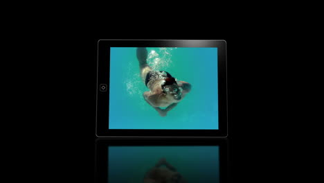 Media-device-screens-showing-girl-swimming