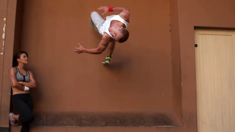 Young-man-doing-a-front-somersault