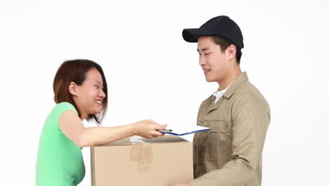 Happy-delivery-man-delivering-cardboard-box