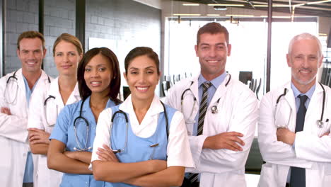 Smiling-medical-team-with-arms-crossed