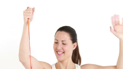 Happy-female-athlete-holding-medal