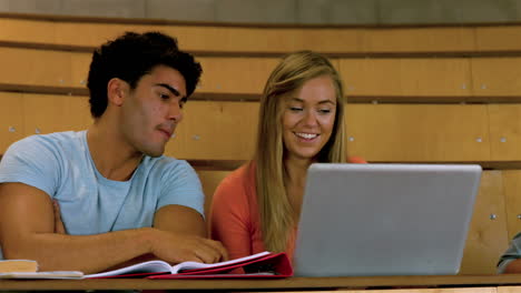 Students-sitting-beside-each-other-while-learning