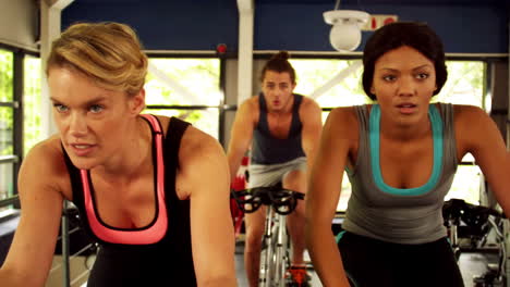 Fitness-group-working-out-on-exercise-bike