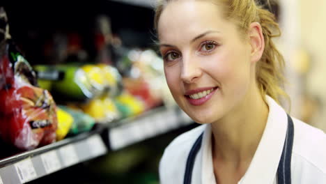 Young-happy-woman-holding-pepper