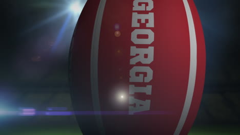 Georgia-Rugby-Ball-Im-Stadion-Mit-Blinkenden-Lichtern-