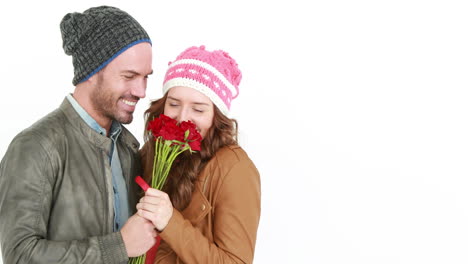 Man-offering-flowers-to-his-girlfriend