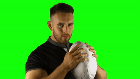 Serious-rugby-player-with-ball-