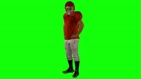 Red-american-football-player-posing