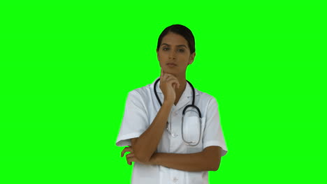 Nurse-standing-and-thinking