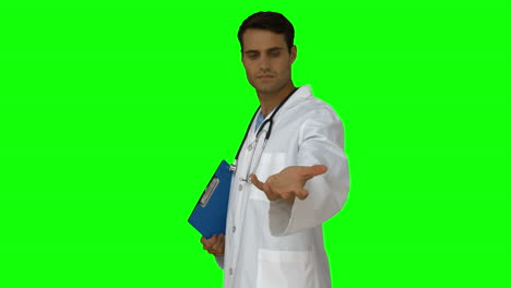 Young-doctor-presenting-with-hand