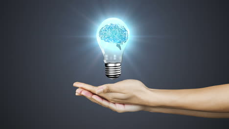 Hands-presenting-light-bulb-with-brain