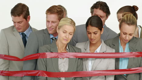 Business-people-surrounding-by-red-strip