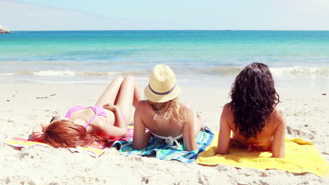 Friends-lying-on-the-beach