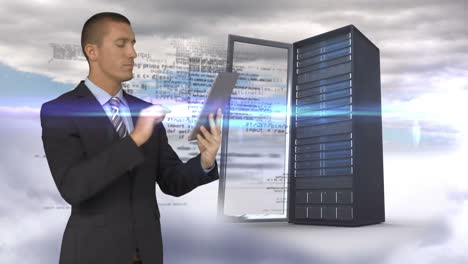 Businessman-using-tablet-computer-in-front-of-server-tower-on-sky-background