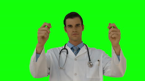 Serious-doctor-holding-something-