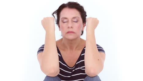 Unhappy-woman-sitting-on-the-floor