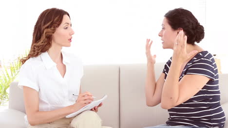 Depressed-woman-talking-with-her-therapist