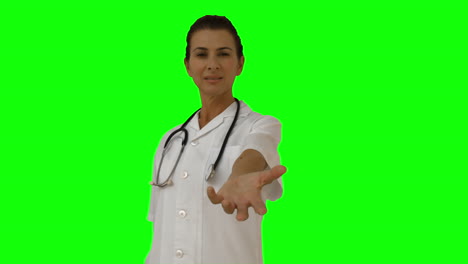 Smiling-female-doctor-presenting-with-her-hand
