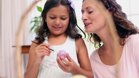 Mother-and-daughter-painting-easter-eggs