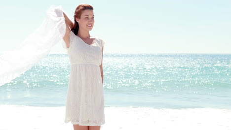Woman-in-white-dress-on-the-beach