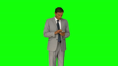 Businessman-using-his-smartphone