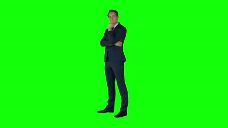 Businessman-thinking-on-green-screen-